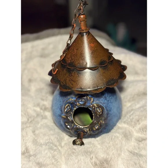 Handmade Blue ceramic birdhouse with a metal, antique copper-finish roof
