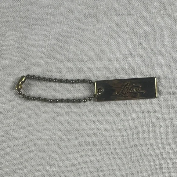 Letisse double sided gold bag charm tag