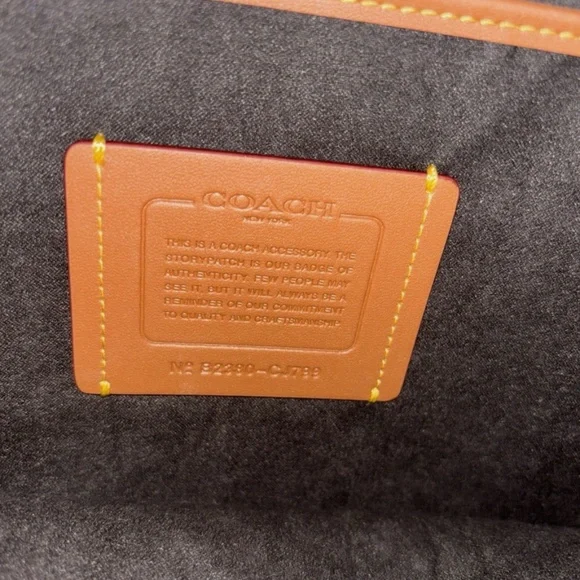 coach zip around laptop case in signature canvas (charcoal)