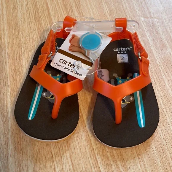 Carter’s size 2 infant/baby sandals/flip-flops black and orange with strap