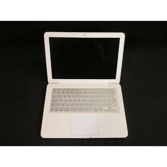 White Macbook With Keyboard Skin