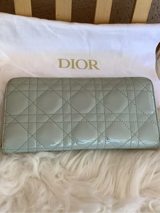 Christian Dior Voyageur wallet made of sage green patent leather