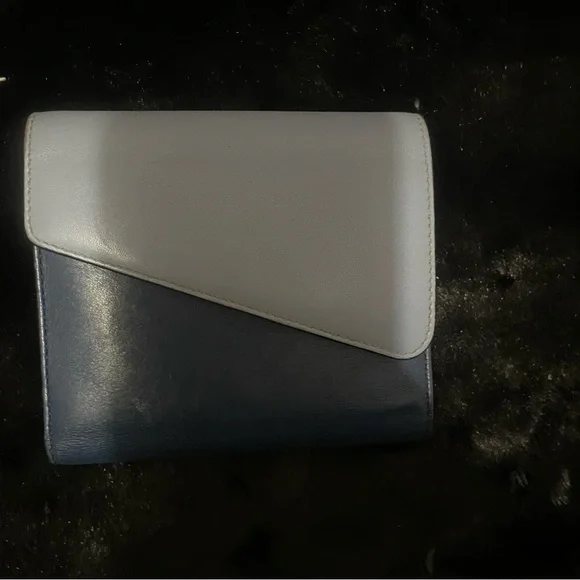 DIOR Diorissimo leather wallet Navy in light blue.