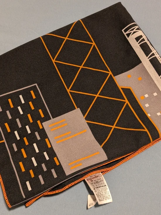Hong Kong Cityscape Print Quickdry Towel in Black and Orange