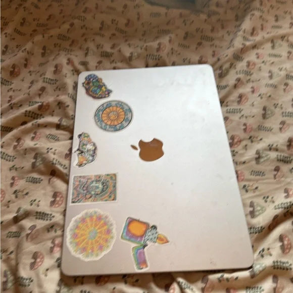 Apple MacBook with Artistic Stickers