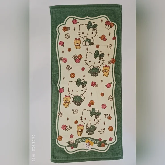 Sanrio face / hands towel. Hello kitty.