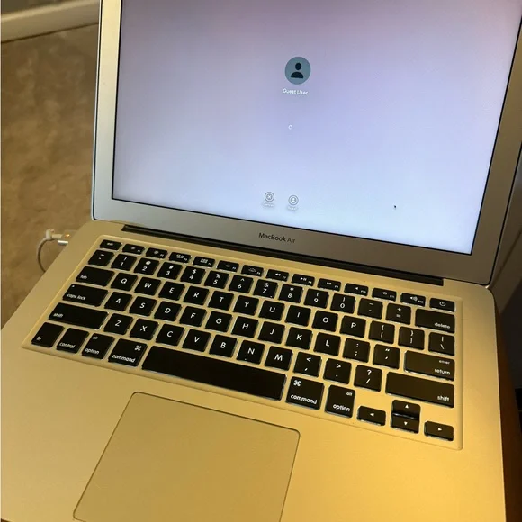 Apple Silver MacBook Laptop with Minimalist Design and Backlit Keyboard