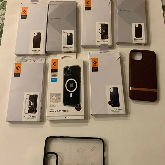 9 Assorted Spigen & Caseology iPhone 14 Plus and iPhone 15 Plus
