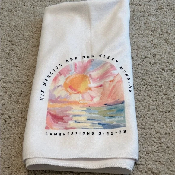 White Towel with Sunrise Design