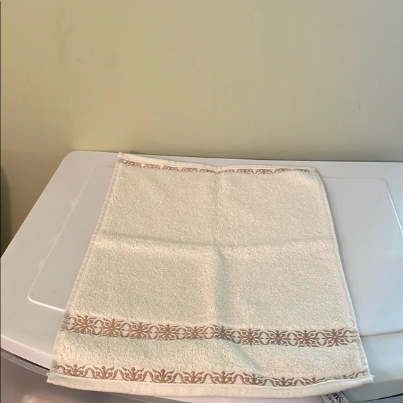Elegant Cream Hand Towel with Tan Design