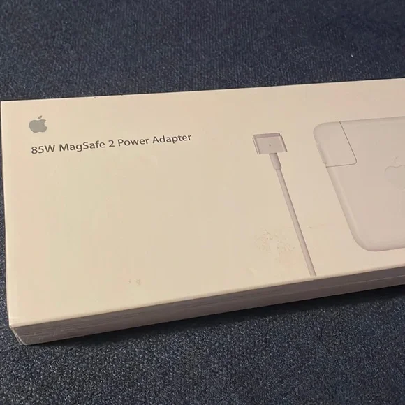Brand new, unopened Apple 85 W MagSafe 2 Power Adapter.