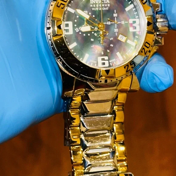 Invicta Reserve Excursion Gold and Silver High Polish watch.