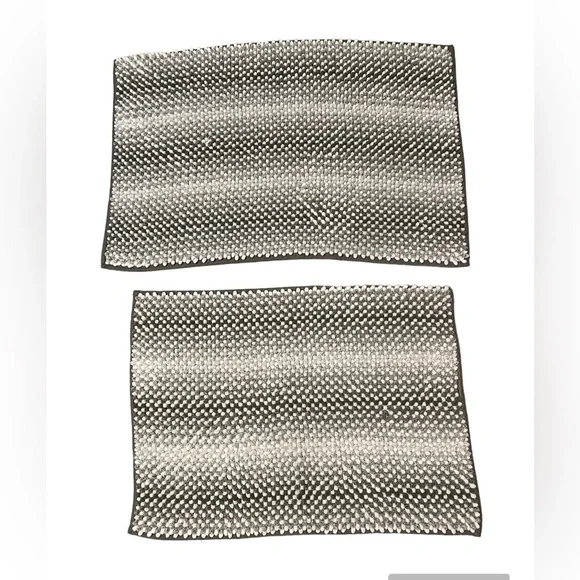 Grey and white bath mats