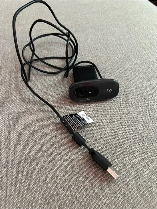 black Logitech C270 HD webcam designed for video calling and recording.