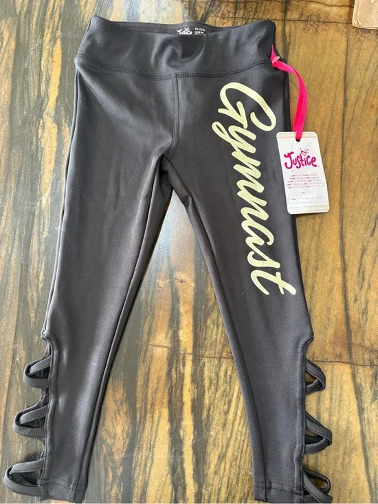 Justice Black Leggings with Pale Gold 'Gymnast' Script and Side Loop Detail