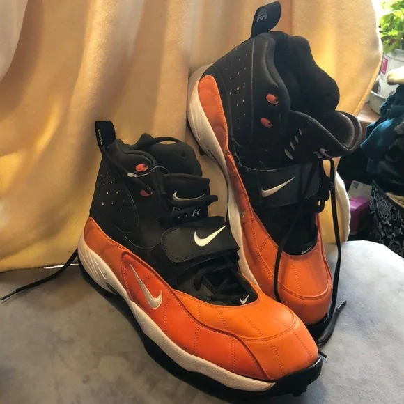 Nike air zoom Orange and brown Black High-Top football cleats never worn 16
