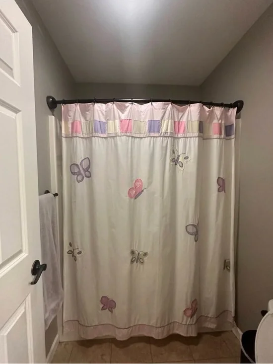 Butterfly Print Shower Curtain, 3 wall hangings, and 2 bathroom mats included.