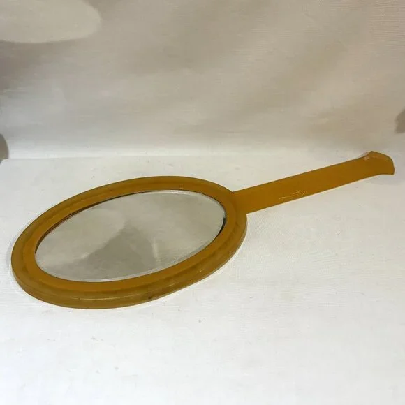Vintage Celluloid Butterscotch Handheld Oval Vanity Mirror