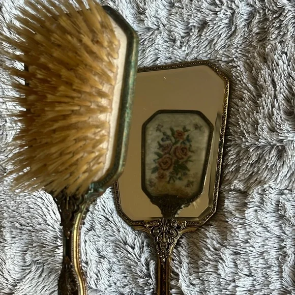 Antique mirror and brush set. Velvet with floral embordery design on back.