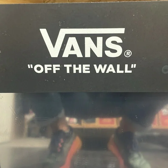 Brand new black metal Vans floor or counter mirror. 10”W/12”H.