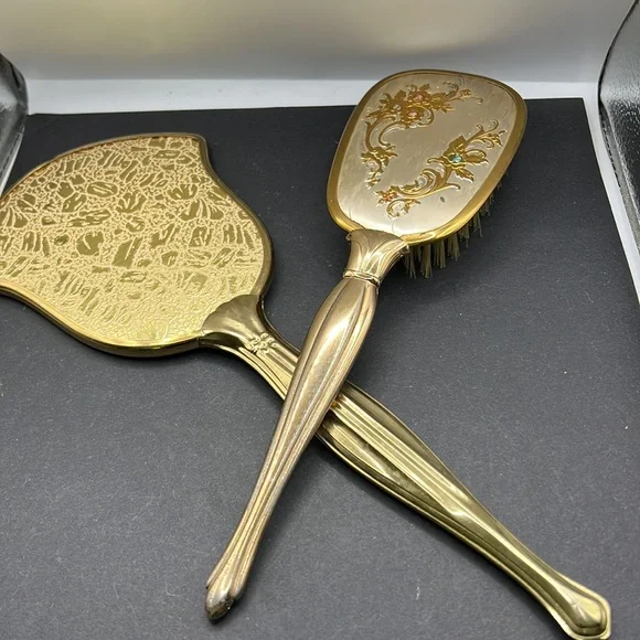 Vintage vanity hand mirror and brush