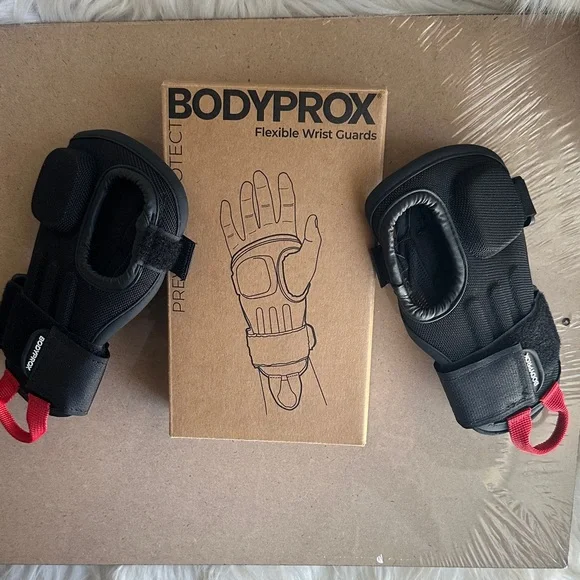 Black Flexible Wrist Guards with Red Pull Tabs