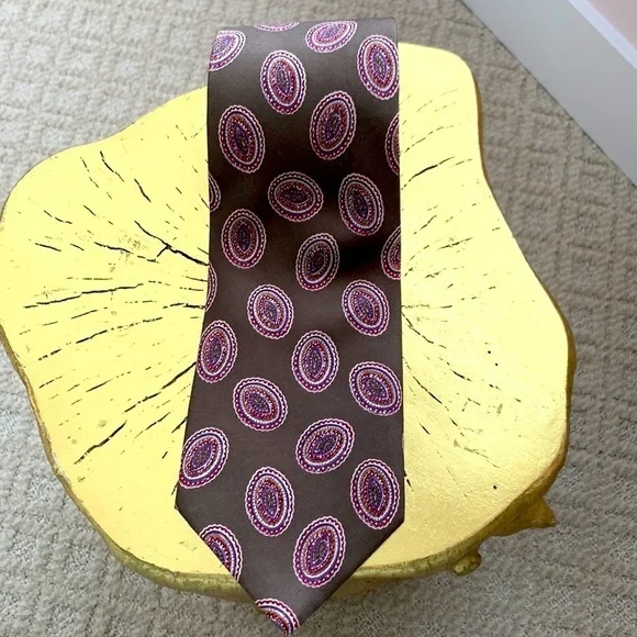 Alexander Cross Ltd Men’s Tie. 100% Silk. Base is Brown with Red & Blue Paisley