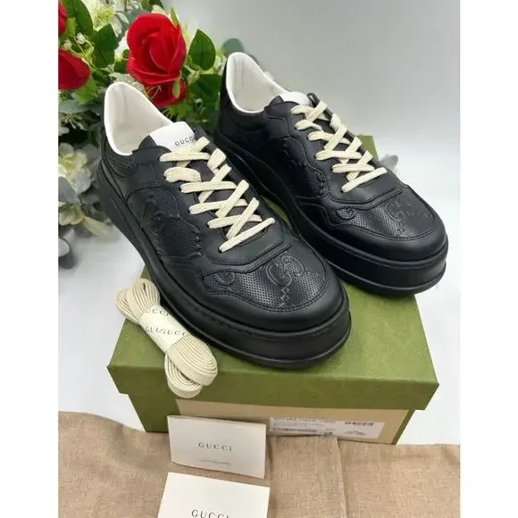 Men's Gucci, GG embossed leather sneakers size 10.5 made in Italy