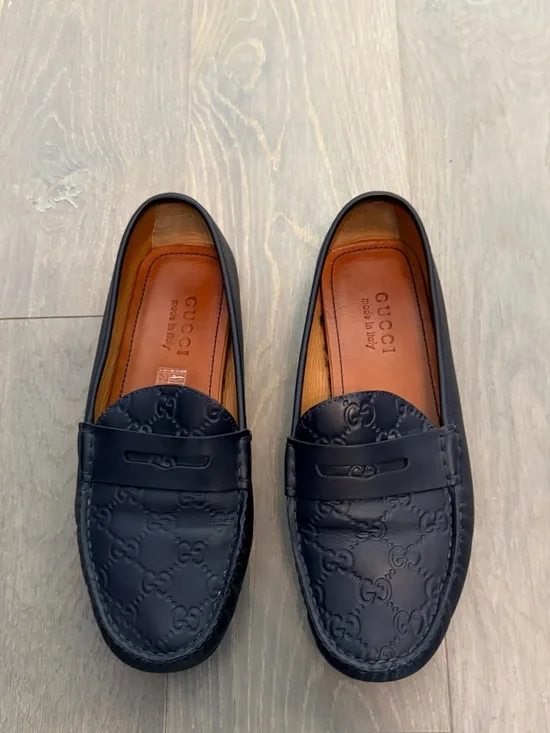 Gucci Men’s Navy Blue Embossed GG Leather Penny Loafers