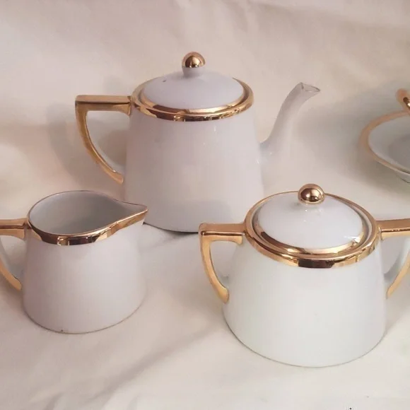 Vintage Noritake Goldena Children's Tea Set. There is a set for 6 counting lids