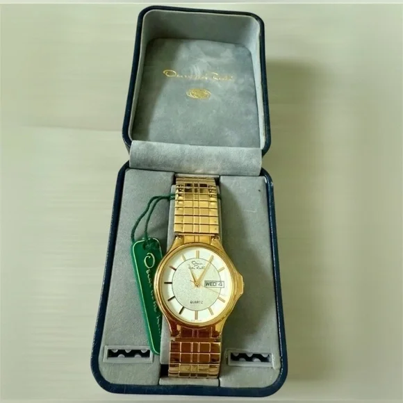 Oscar de la Renta Gold and White Watch needs new batteries