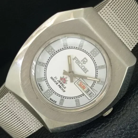 Vintage 1972 Ricoh Automatic Mens Silver Watch W/daydate & White accents