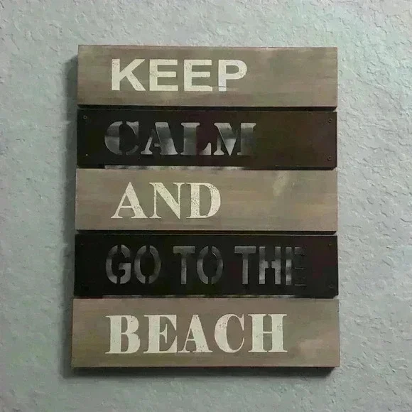 Metal and wood sign