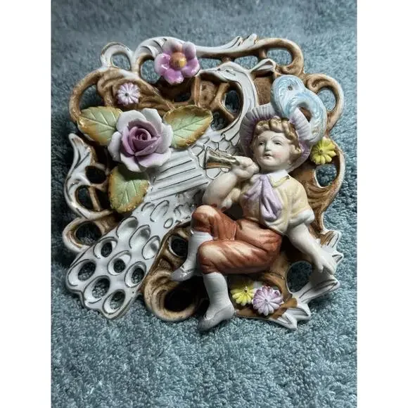 Vintage Porcelain Wall Plaque With Cherub And Floral Design