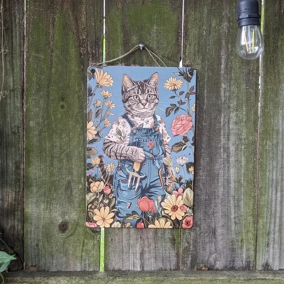Male cat gardening, yellow red flowers blue metal tin garden sign