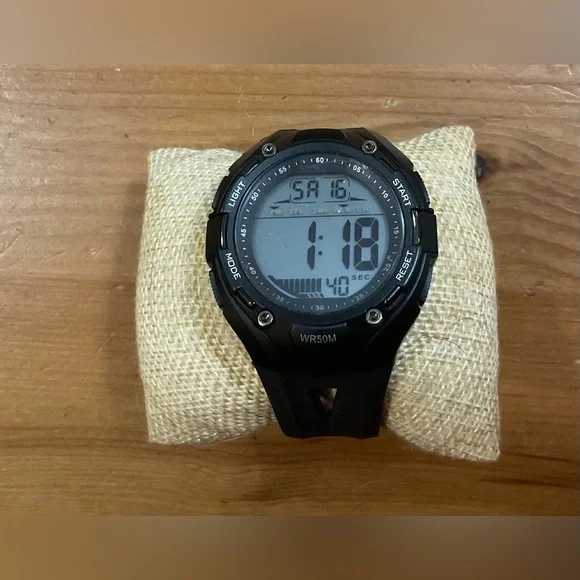 Brigadeon: BTW1801/ 5ATM Men’s black digital adjustable plastic wrist watch.