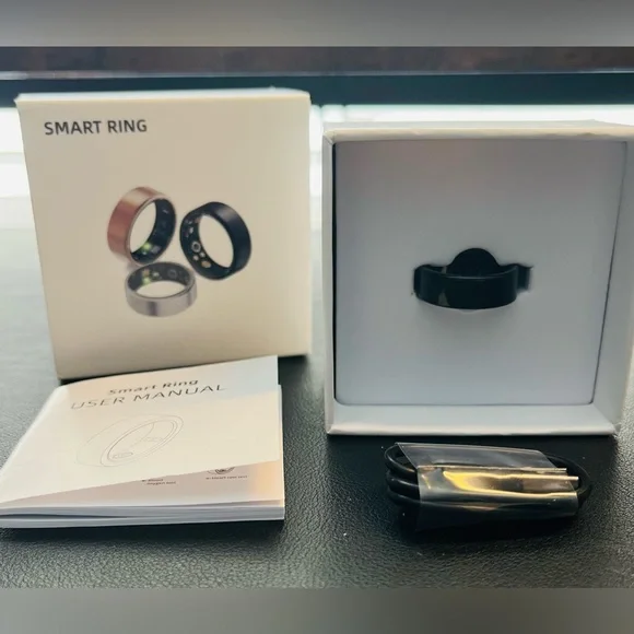 Black Smart Ring - size 8. Comes With Instructions and Charging Cord.