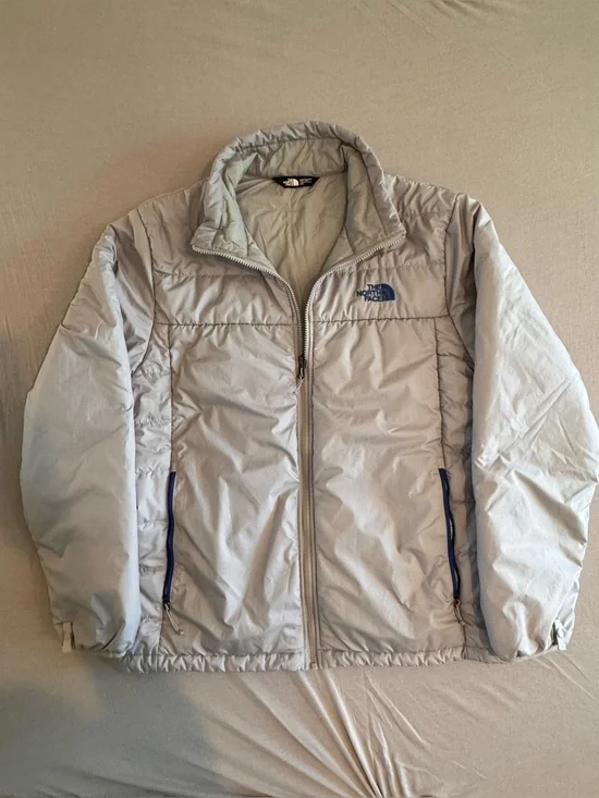 The North Face Light Gray Men's Puffer Jacket with Blue Accents