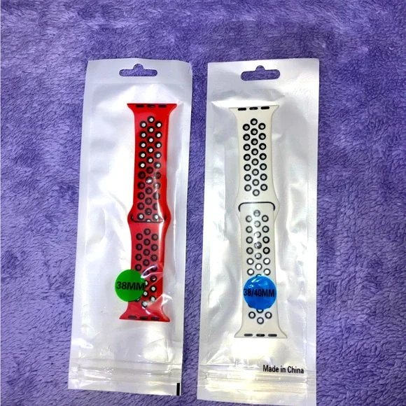 Two Apple Watch bands red and white