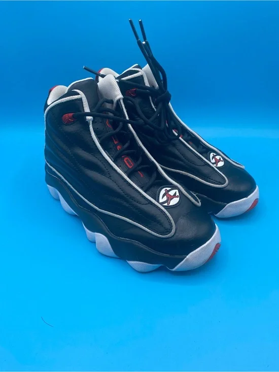 Jordan Pro Strong black, white, and university red