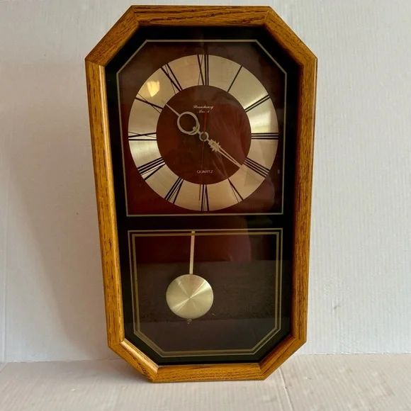 Vtg Strausbourg Manor brown oak wall clock with moon and star hands by Quartz.