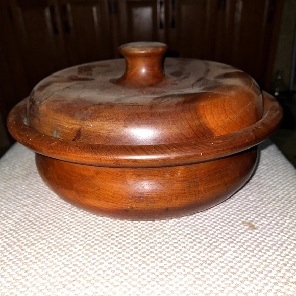 A handmade wooden bowl. It is signed, but I'm not certain of the name.