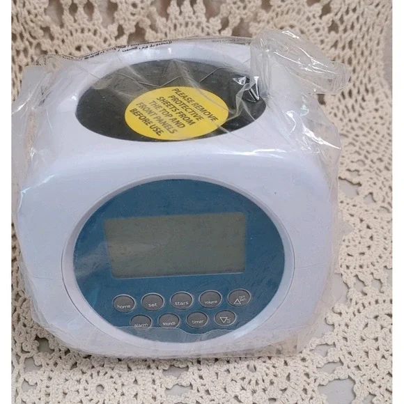 Discovery Projection Alarm Clock Sound Machine. 6 Nature & 4 Alarm Sounds. Stars