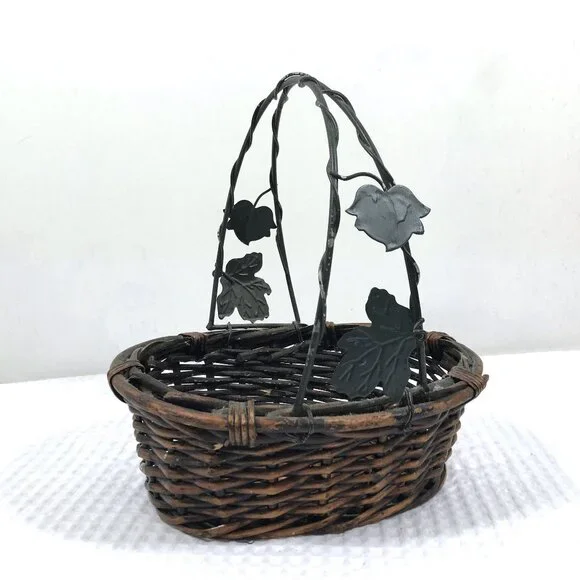 Vintage basket with handle and metal leaves