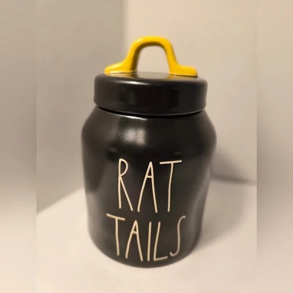 Rae Dunn Black Canister with Yellow Handle 'RAT TAILS' text‎