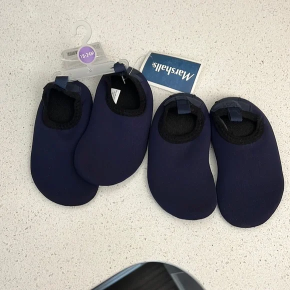NWT one pair and never worn other pair. Water shoes.