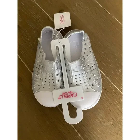 NWT Capelli New York, silver slip on water shoes girls size 8.