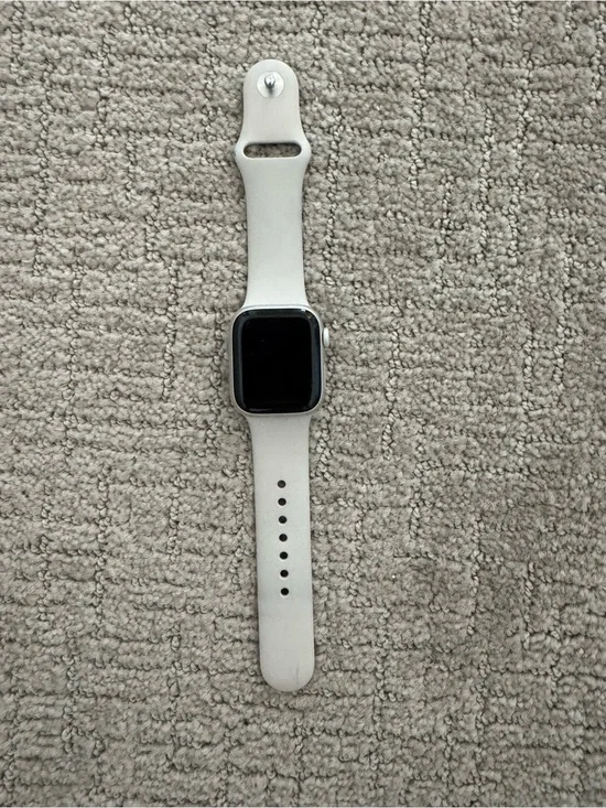 Apple Smartwatch with White Silicone Band and Silver Case