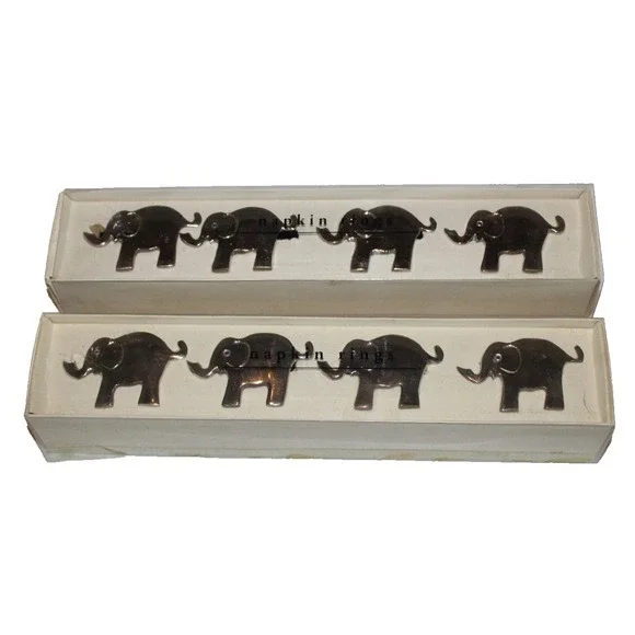 set of 8 Pier One nickel plated elephant napkin rings trunks up (2 boxes of 4)