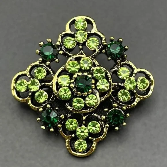 Yellow Gold with Emerald and Peridot Green Crystal Ornate Pin Back Brooch
